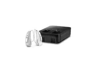 Rechargeable hearing aids with compact charging station.